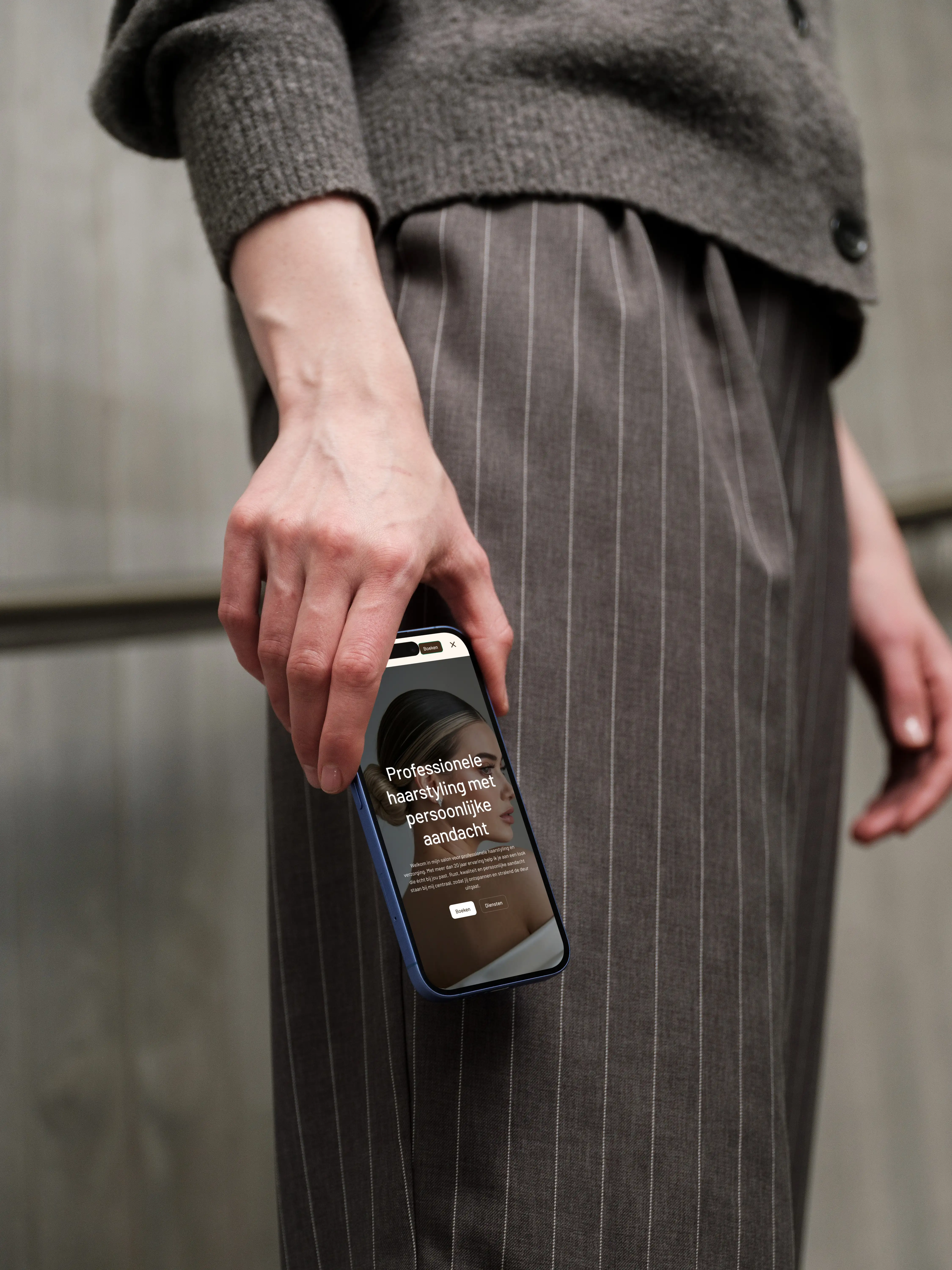 Model holding a phone